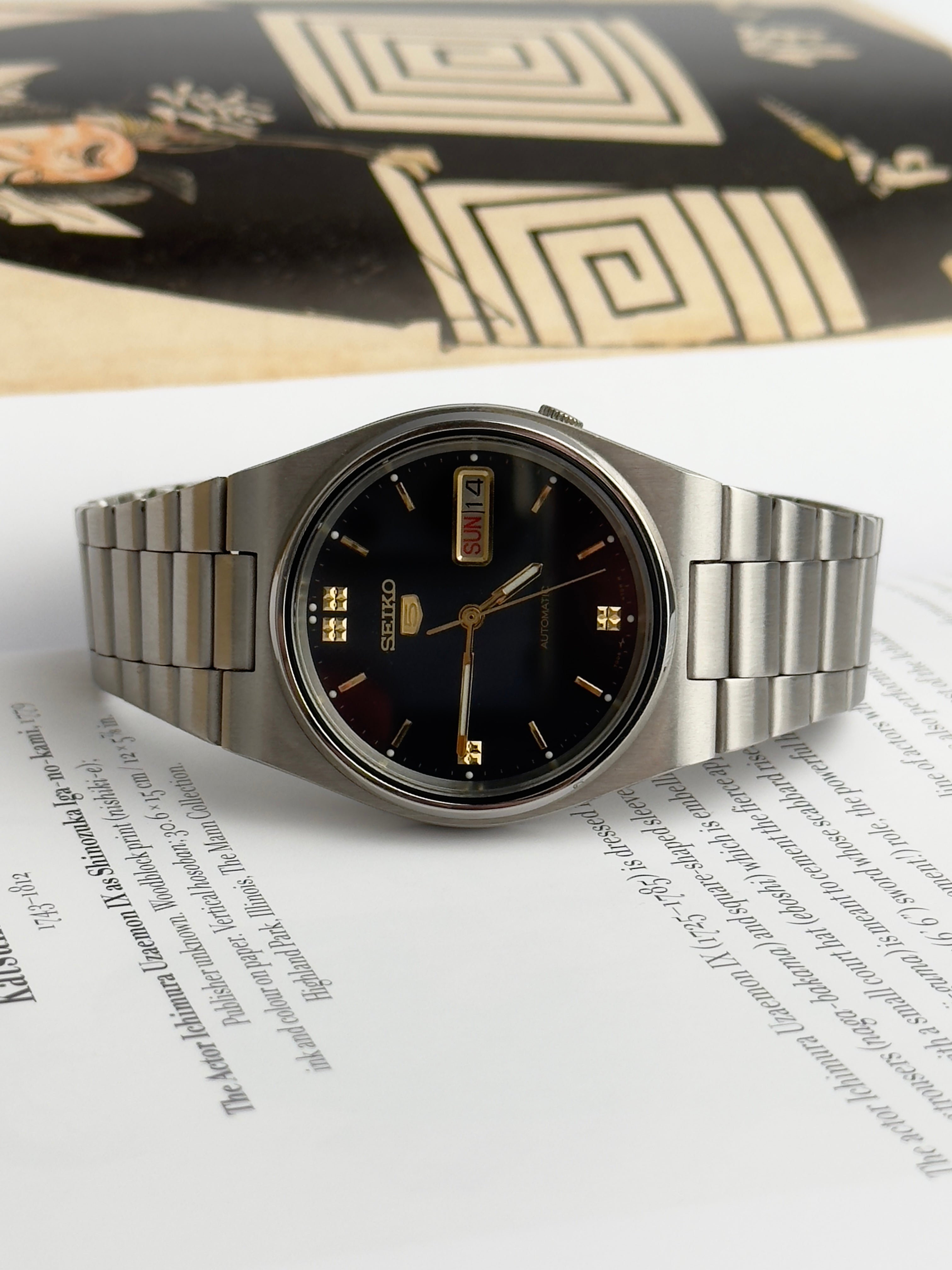 Seiko 5 7009-3130 Black and Gold